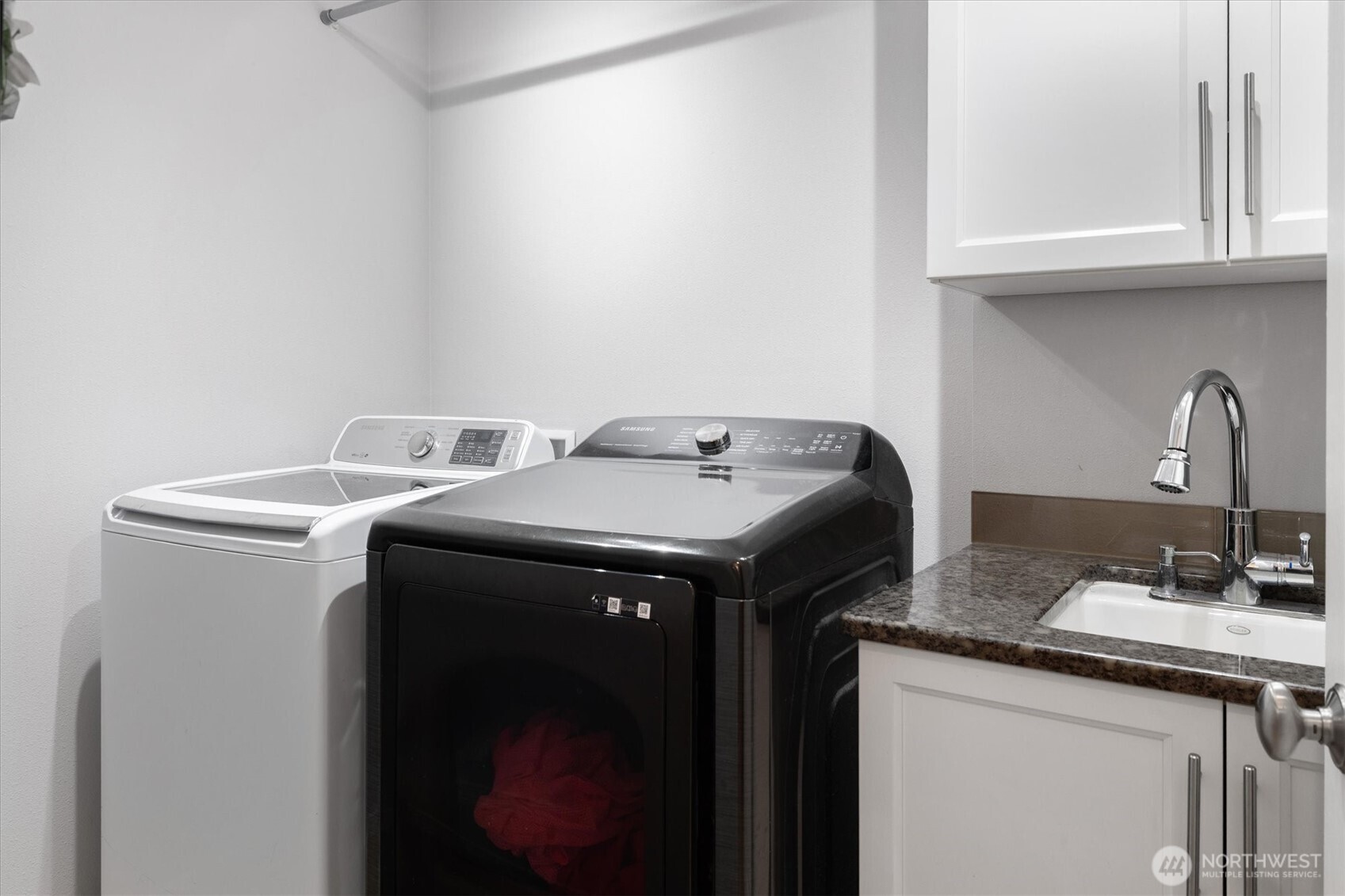 17018 45th Street East Lake Tapps, WA 98391 - Photo 29 of 40 a utility room with sink dryer and washer