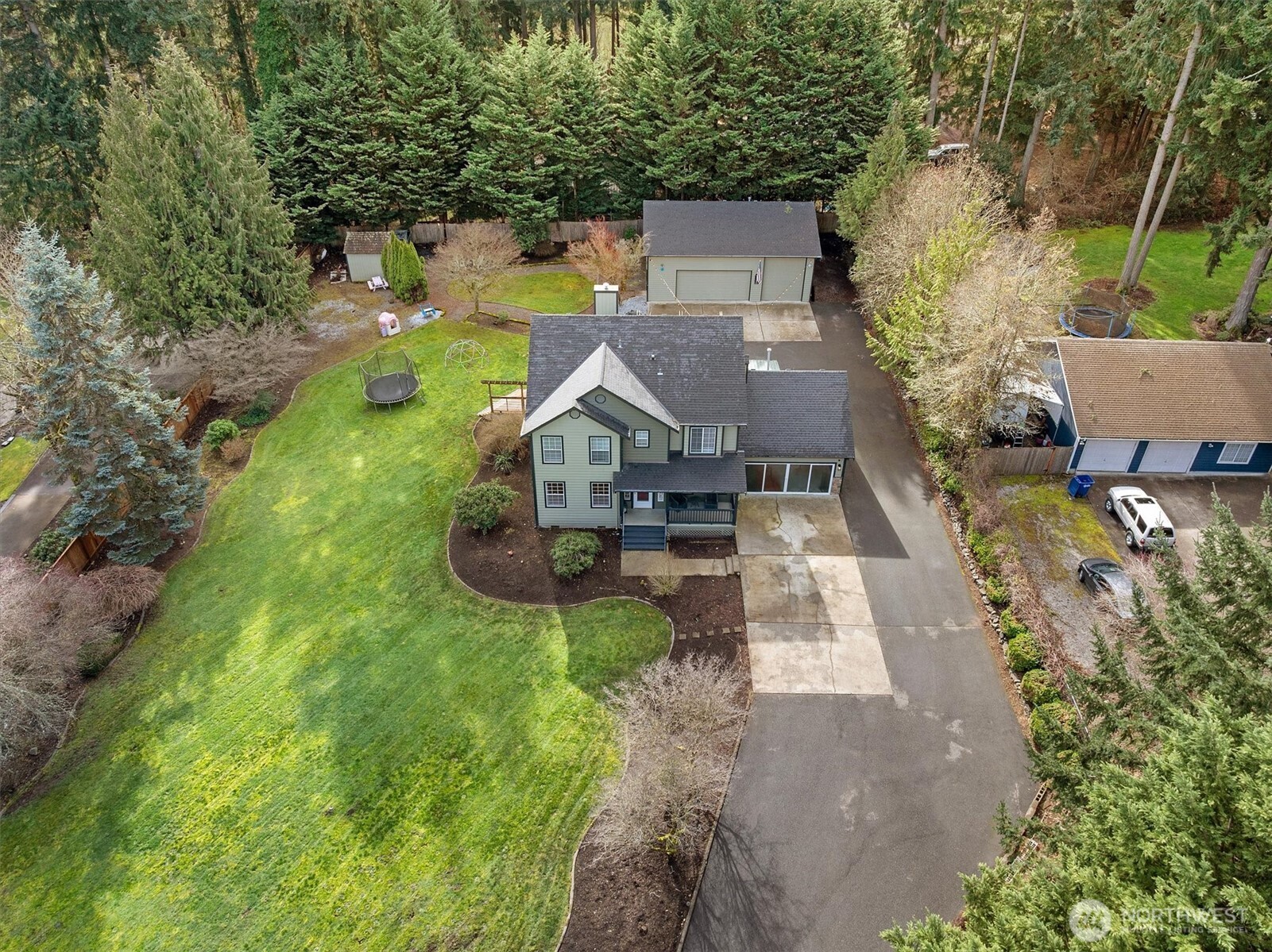 17018 45th Street East Lake Tapps, WA 98391 - Photo 31 of 40 an aerial view of a house with yard swimming pool and outdoor seating