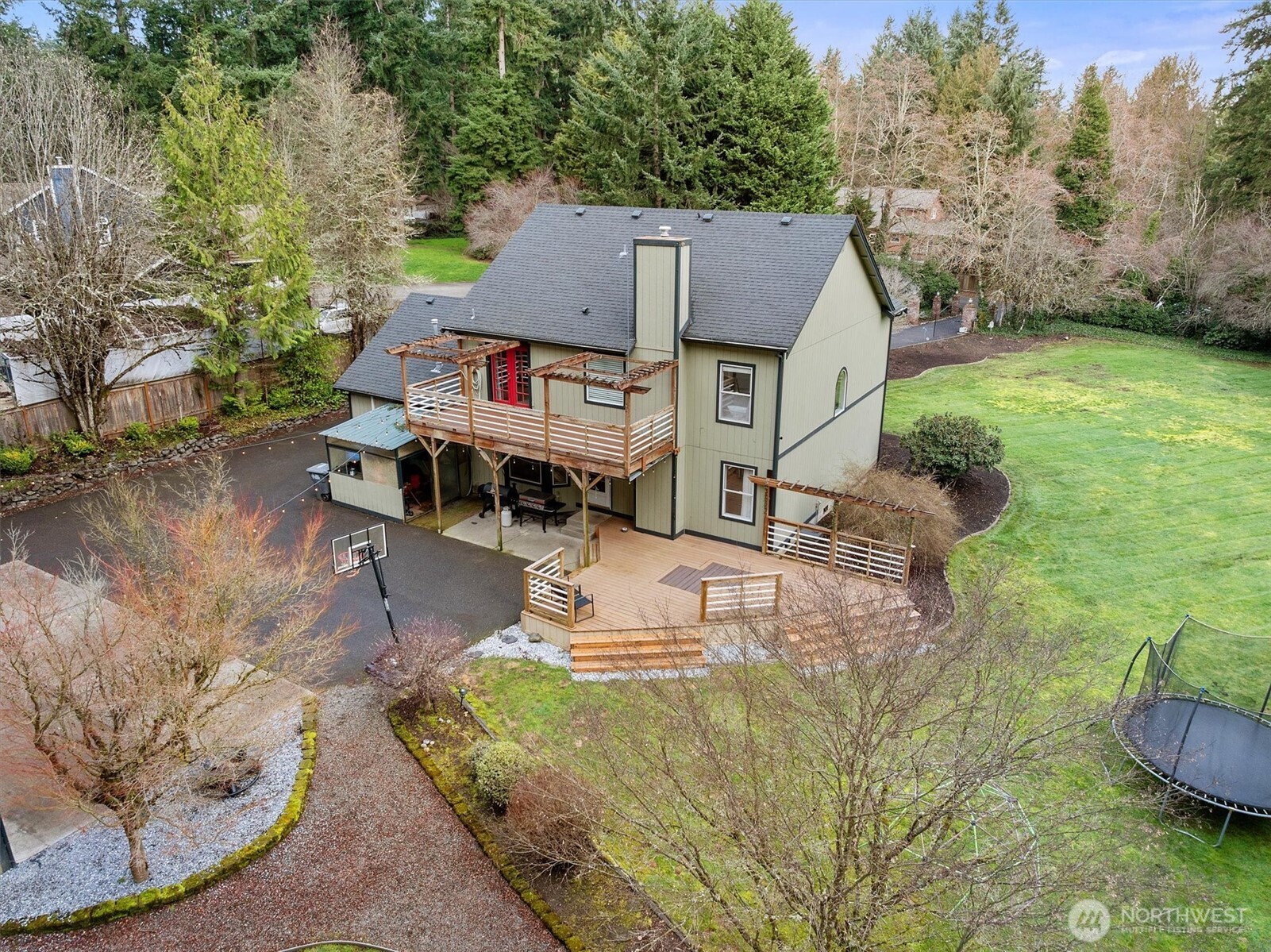 17018 45th Street East Lake Tapps, WA 98391 - Photo 32 of 40 an aerial view of a house with swimming pool garden and patio