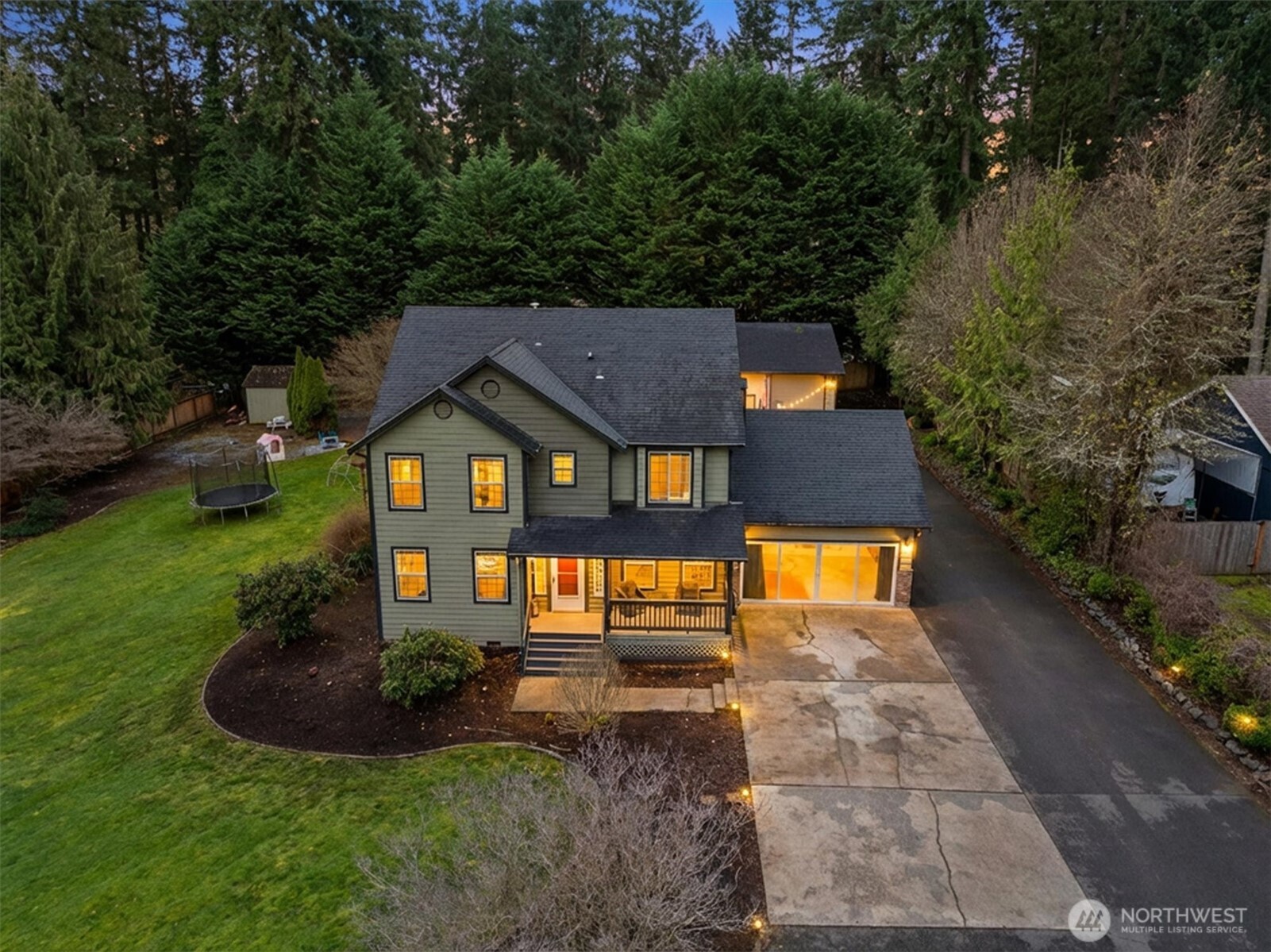 17018 45th Street East Lake Tapps, WA 98391 - Photo 37 of 40 a front view of a house with a yard