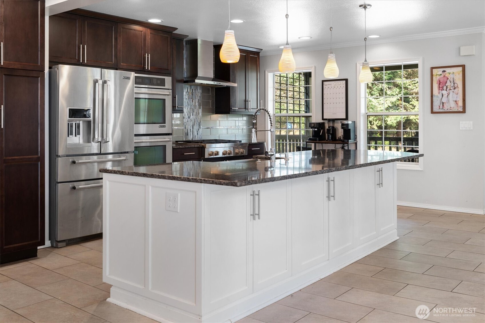 17018 45th Street East Lake Tapps, WA 98391 - Photo 7 of 40 a kitchen with stainless steel appliances a refrigerator sink and microwave