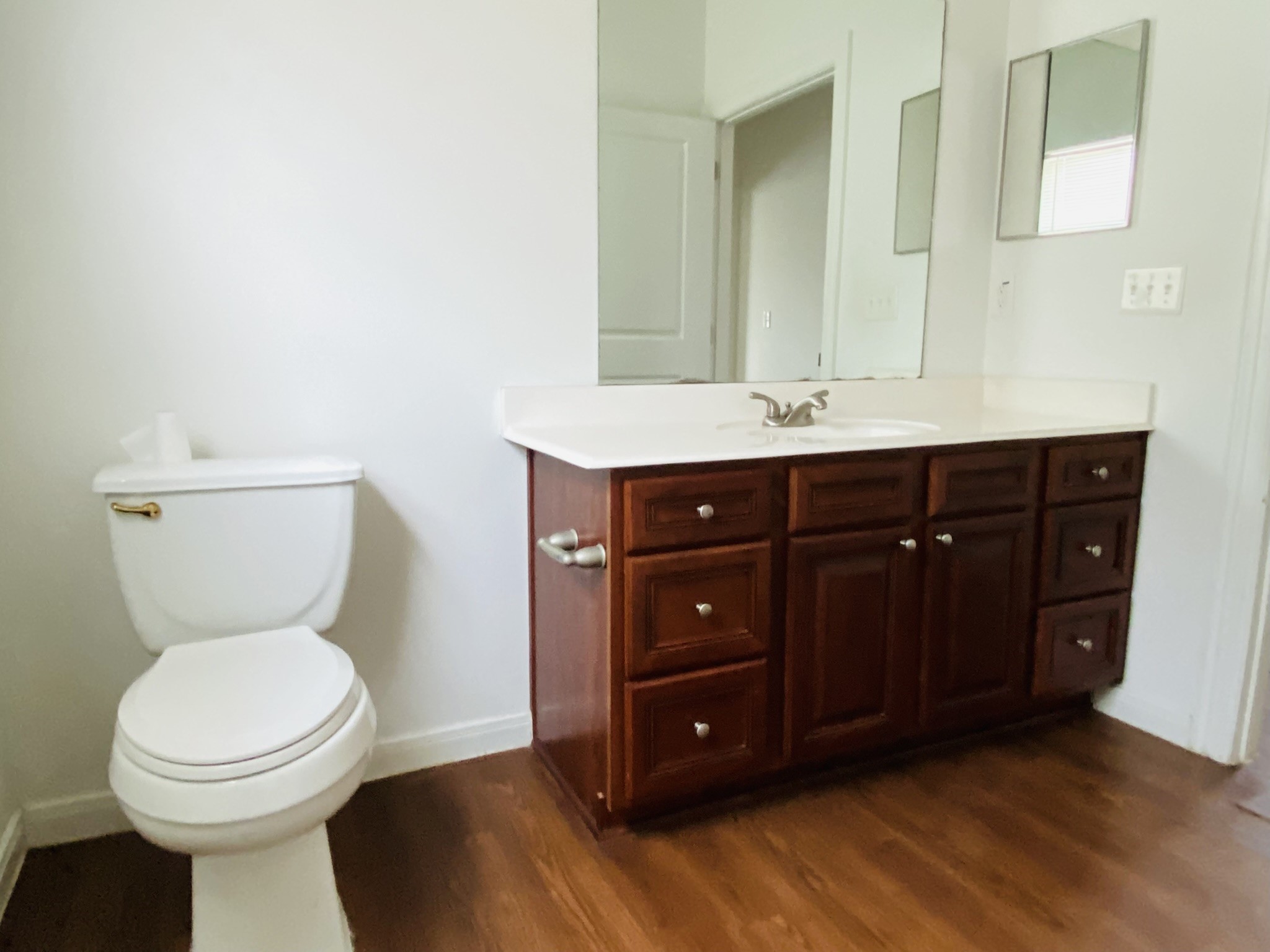 2503 Deats Road Dickinson, TX 77539 - Photo 18 of 28 a bathroom with a toilet a sink and mirror