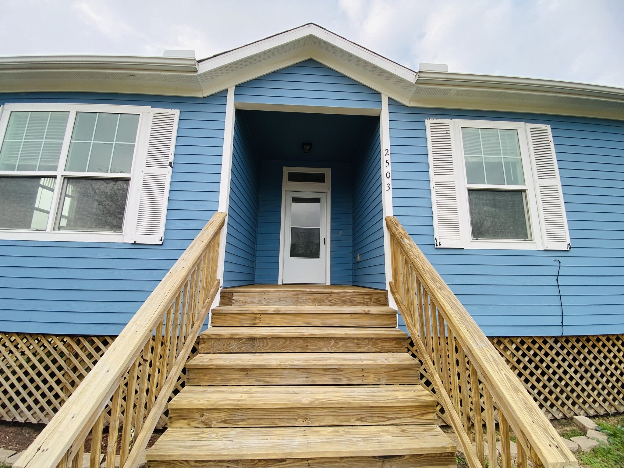 2503 Deats Road Dickinson, TX 77539 - Photo 2 of 28 a view of a house with wooden door