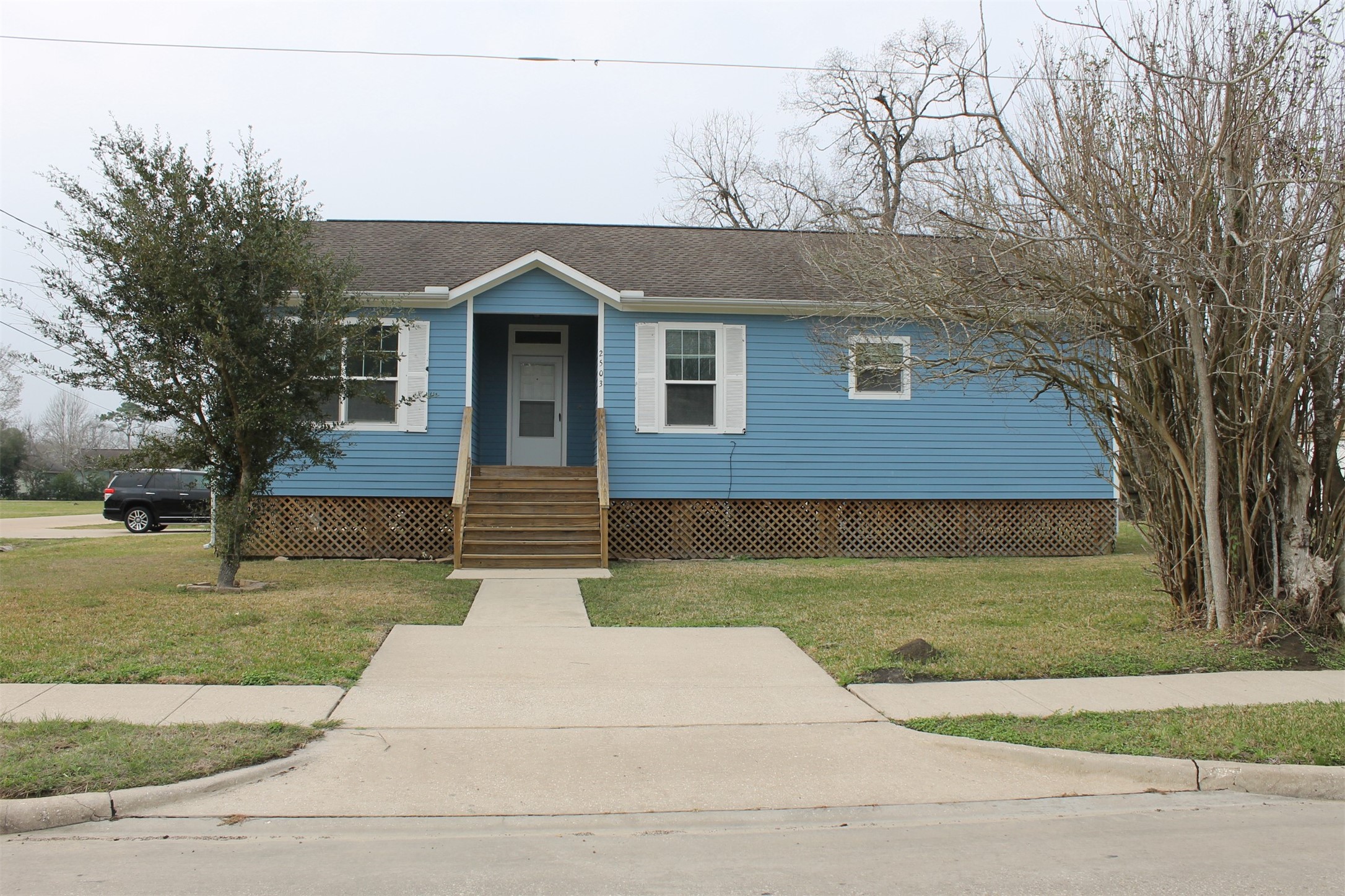 2503 Deats Road Dickinson, TX 77539 - Photo 22 of 28 a front view of a house with a yard
