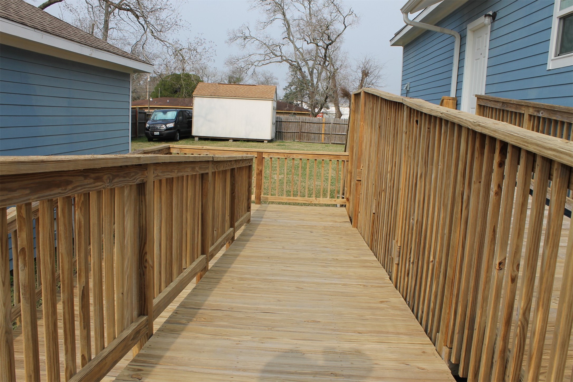 2503 Deats Road Dickinson, TX 77539 - Photo 27 of 28 a view of a wooden door and brick walls
