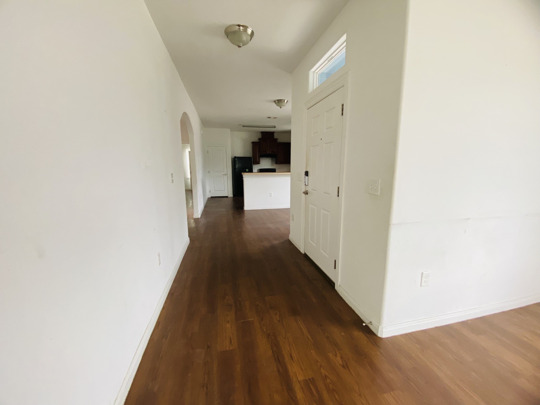 2503 Deats Road Dickinson, TX 77539 - Photo 4 of 28 a view of a hallway with wooden floor