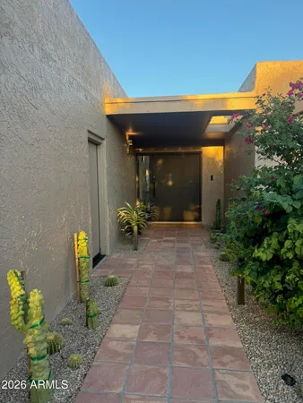 a view of path along with potted plant