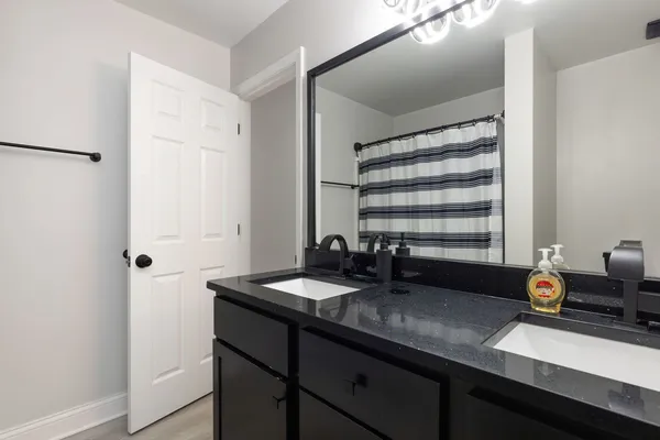 a kitchen with a sink and a window
