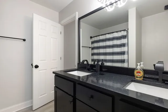 a kitchen with a sink and a window