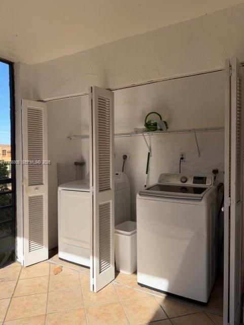 9370 Southwest 8th Street, Unit 418 Boca Raton, FL 33428 - Photo 12 of 19 a kitchen with stainless steel appliances granite countertop a refrigerator and a sink