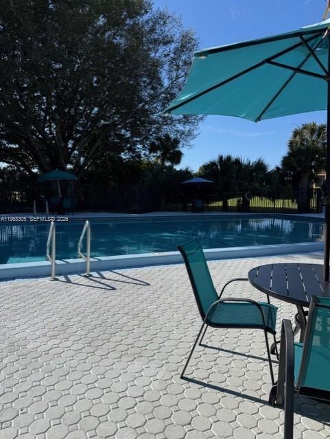 9370 Southwest 8th Street, Unit 418 Boca Raton, FL 33428 - Photo 15 of 19 a view of a outdoor space with seating