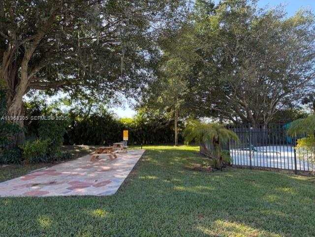 9370 Southwest 8th Street, Unit 418 Boca Raton, FL 33428 - Photo 19 of 19 a view of a park with trees