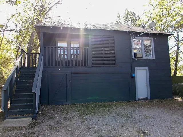 a view of a livingroom with a flat screen tv