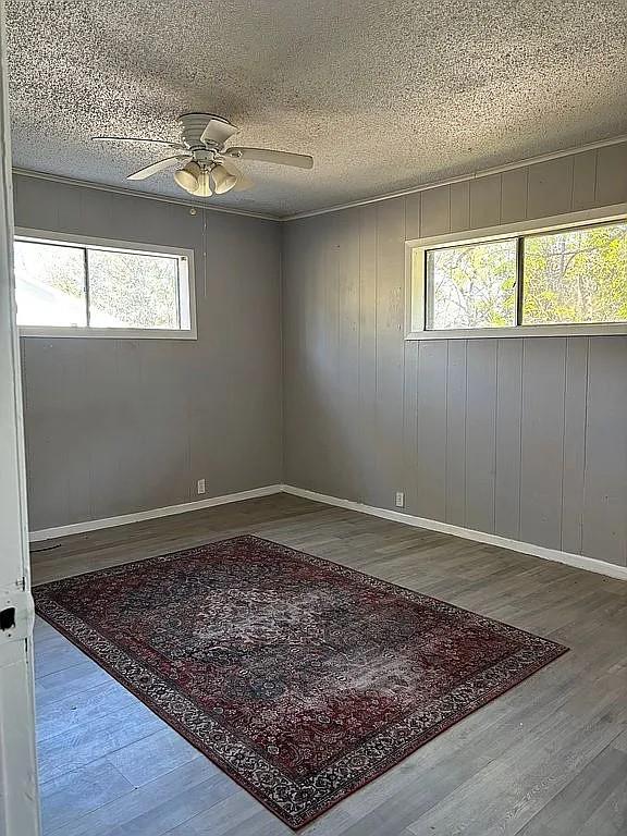 1711 Ash Street Commerce, TX 75428 - Photo 9 of 11 a view of a window in an empty room