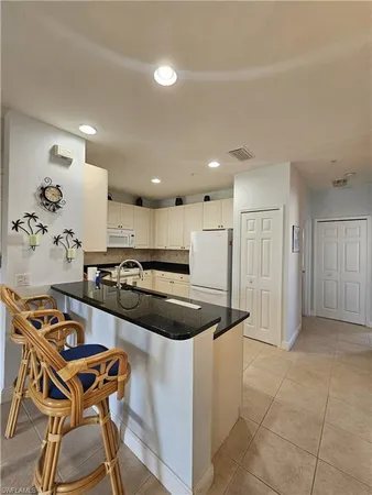 $6,000 | 1405 Sweetwater Cove, Unit 204, Naples, FL 34110