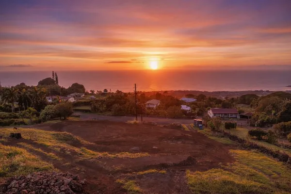 a view of a city with sunset view