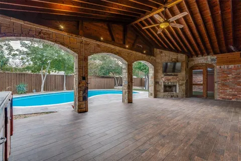 a view of a porch with a backyard