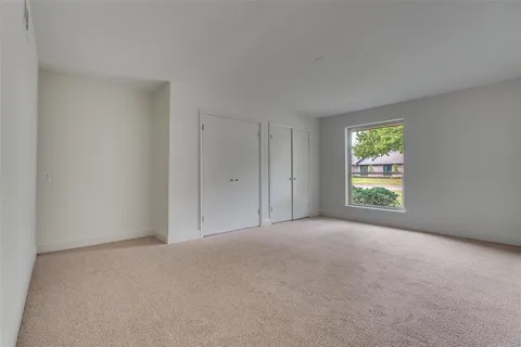 a view of a room that has a window in it