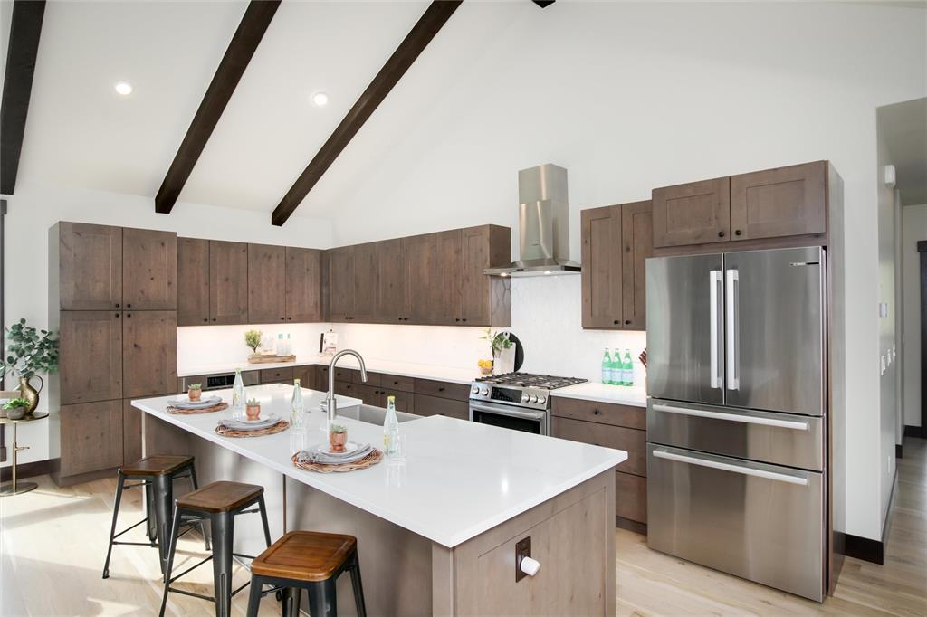 55 Glazer Trail Silverthorne, CO 80498 - Photo 12 of 35 a kitchen with a sink and refrigerator