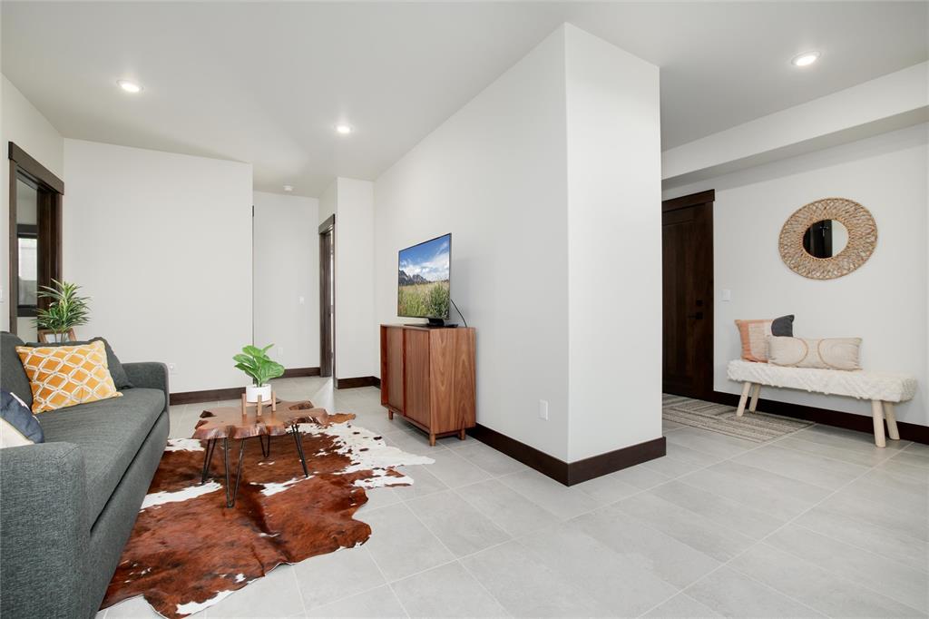 55 Glazer Trail Silverthorne, CO 80498 - Photo 23 of 35 a living room with furniture and a air conditioner vent
