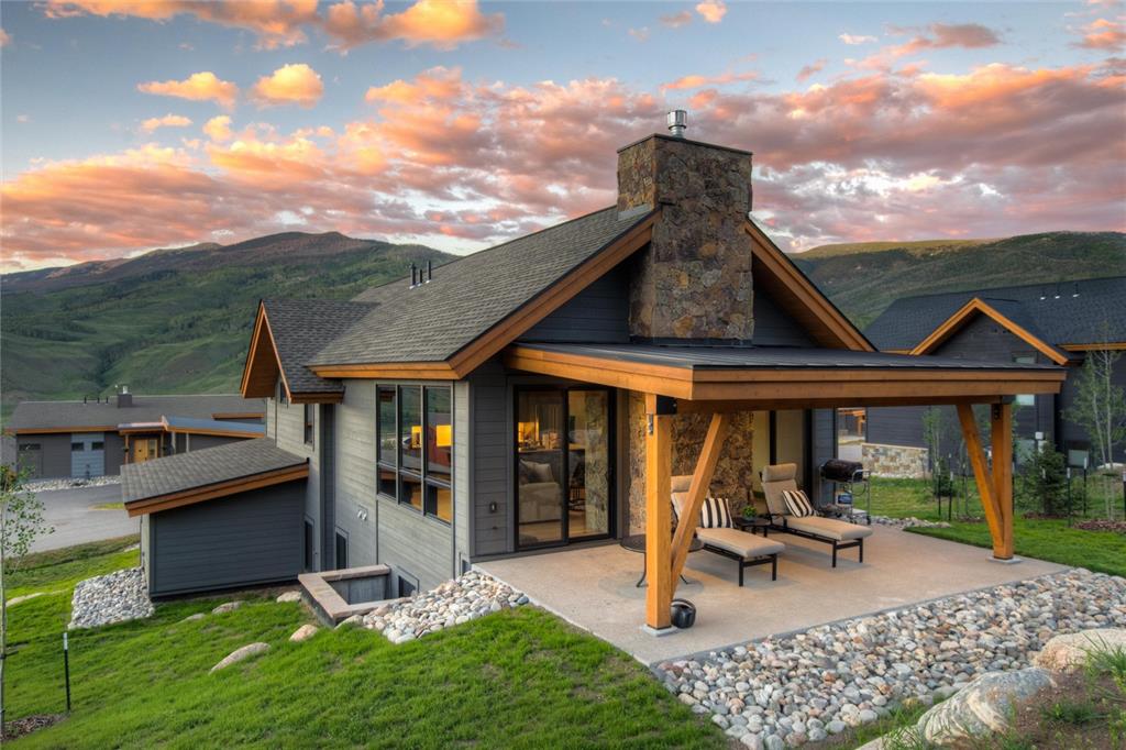 55 Glazer Trail Silverthorne, CO 80498 - Photo 3 of 35 a front view of a house with garden