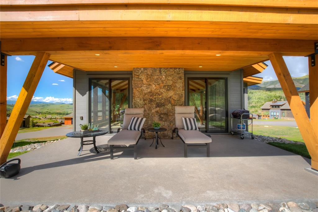 55 Glazer Trail Silverthorne, CO 80498 - Photo 31 of 35 a view of a swimming pool with outdoor seating