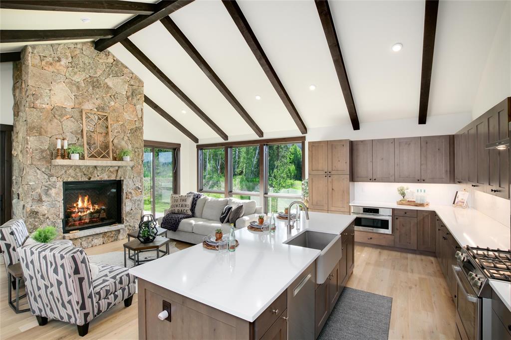 55 Glazer Trail Silverthorne, CO 80498 - Photo 10 of 35 a living room with furniture and a fireplace