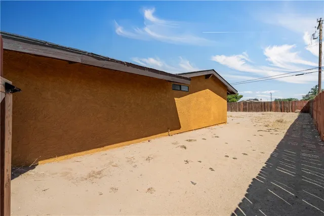 a view of a ocean with a building in the background