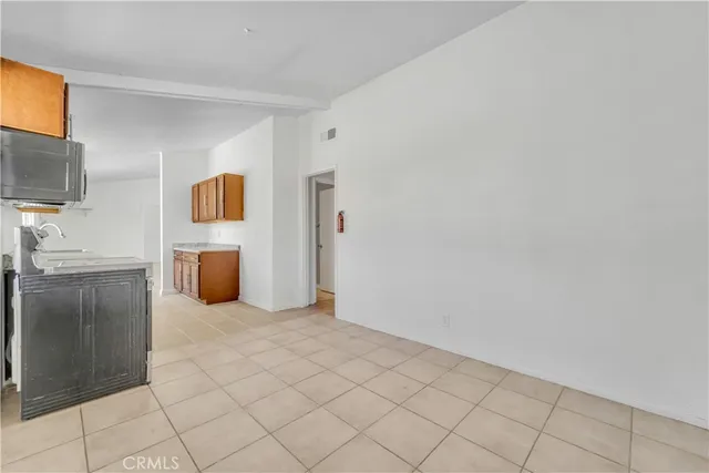 a view of livingroom with furniture and flat screen tv