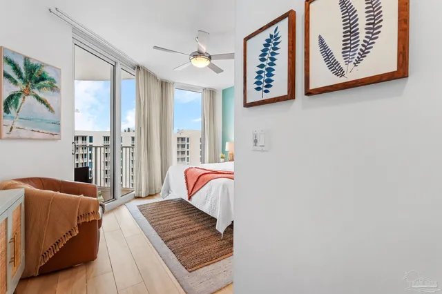 a bedroom with furniture and a window