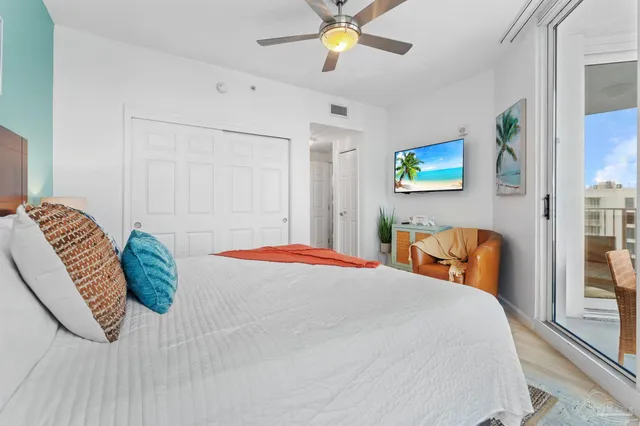 a bedroom with a bed and dresser