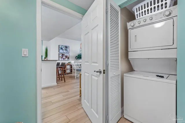 a view of hallway with washer and dryer