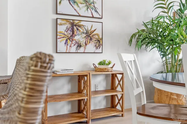 a workspace with furniture and a potted plant