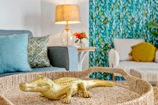 a bedroom with a bed and a couch