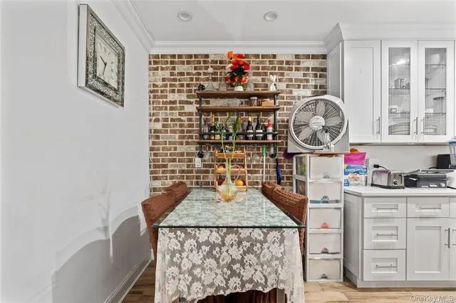 a view of a kitchen with granite countertop and a stove