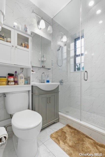 35-21 81st Street, Unit 1C Queens, NY 11372 - Photo 9 of 9 a bathroom with a sink toilet and shower