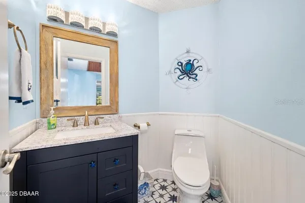 a picture of a bathroom with a shower