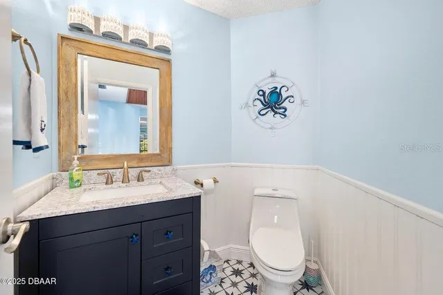 a picture of a bathroom with a shower