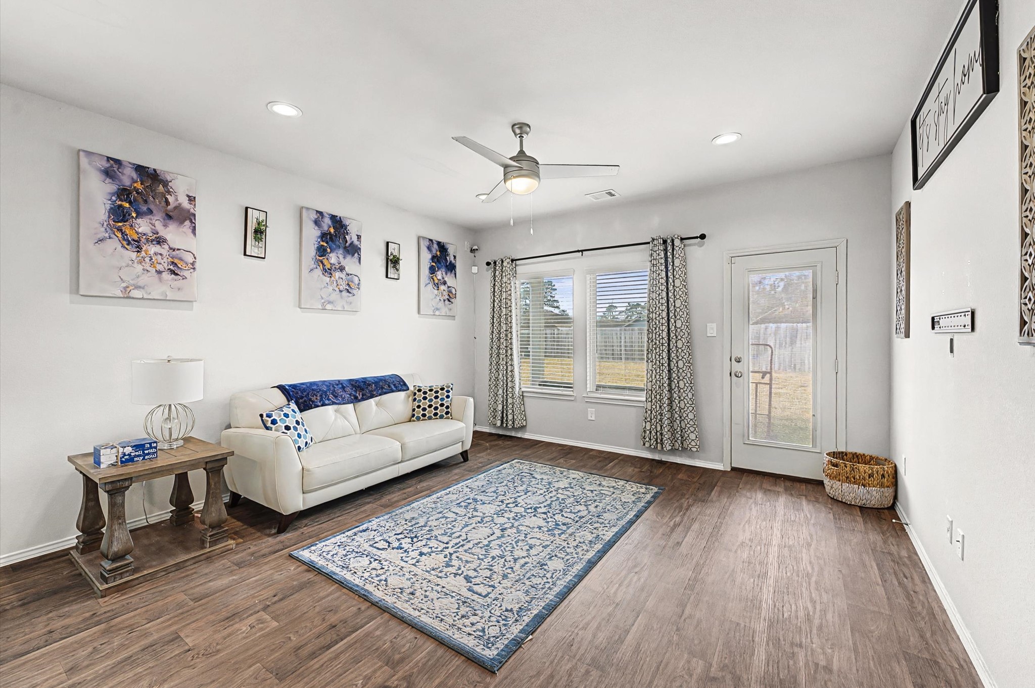 22803 Berthoud Trail Spring, TX 77373 - Photo 13 of 42 a living room with furniture and wooden floor
