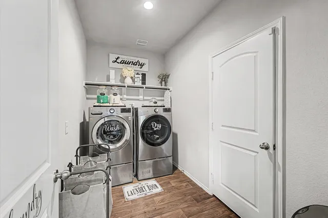 a utility room with dryer and washer