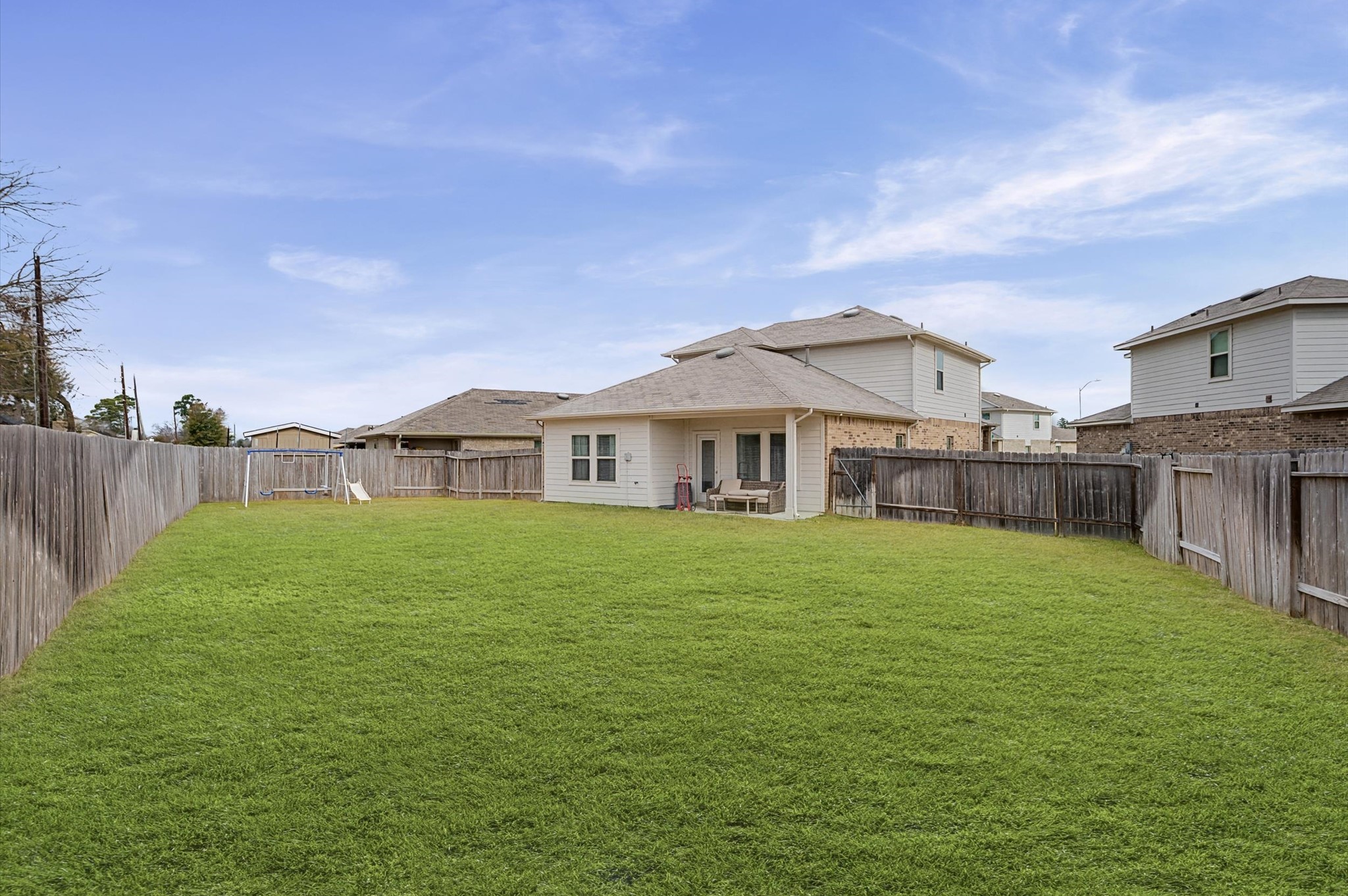 22803 Berthoud Trail Spring, TX 77373 - Photo 27 of 42 a view of a house next to a big yard with large trees
