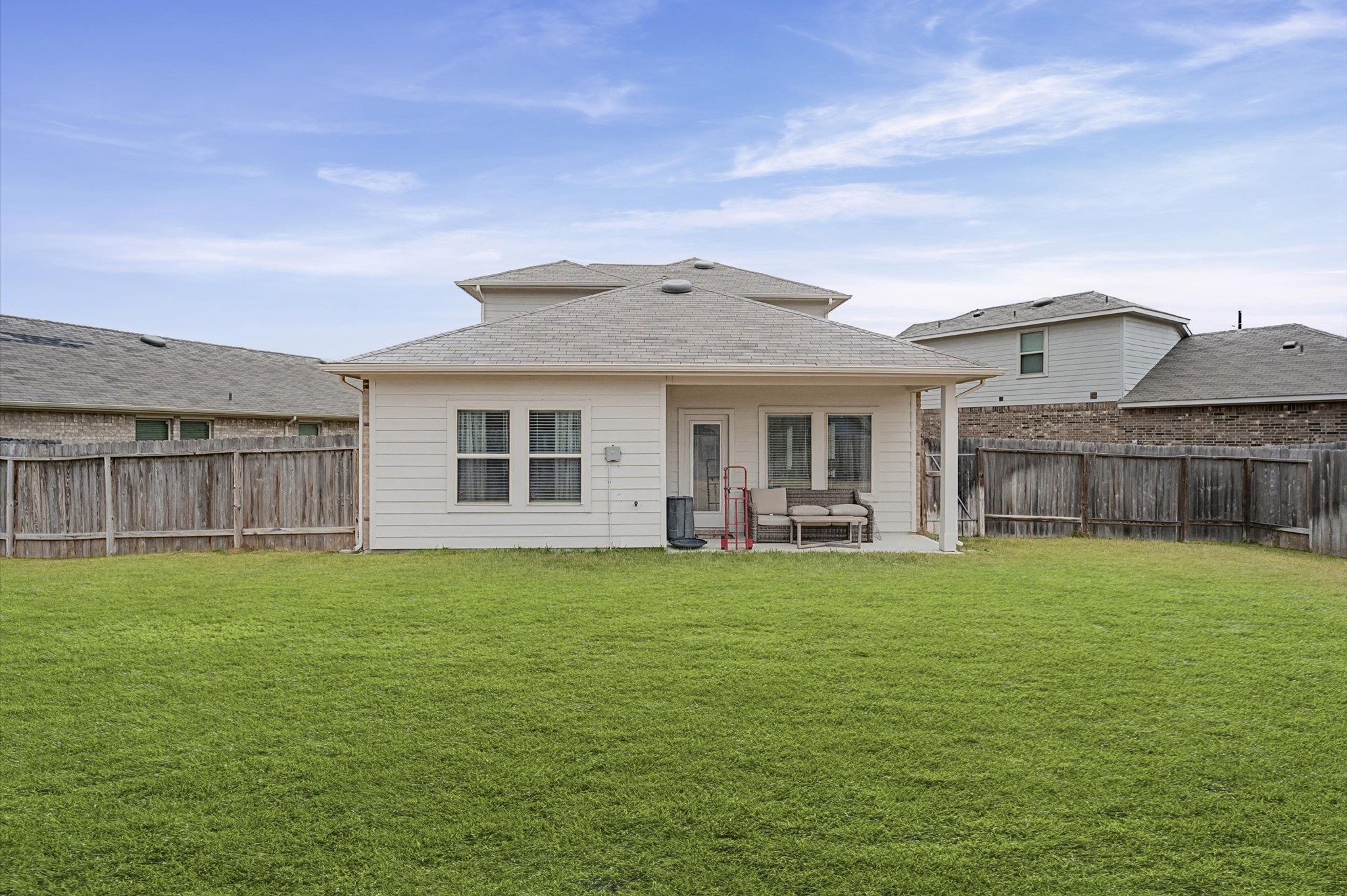 22803 Berthoud Trail Spring, TX 77373 - Photo 28 of 42 a front view of house with yard barbeque and outdoor seating