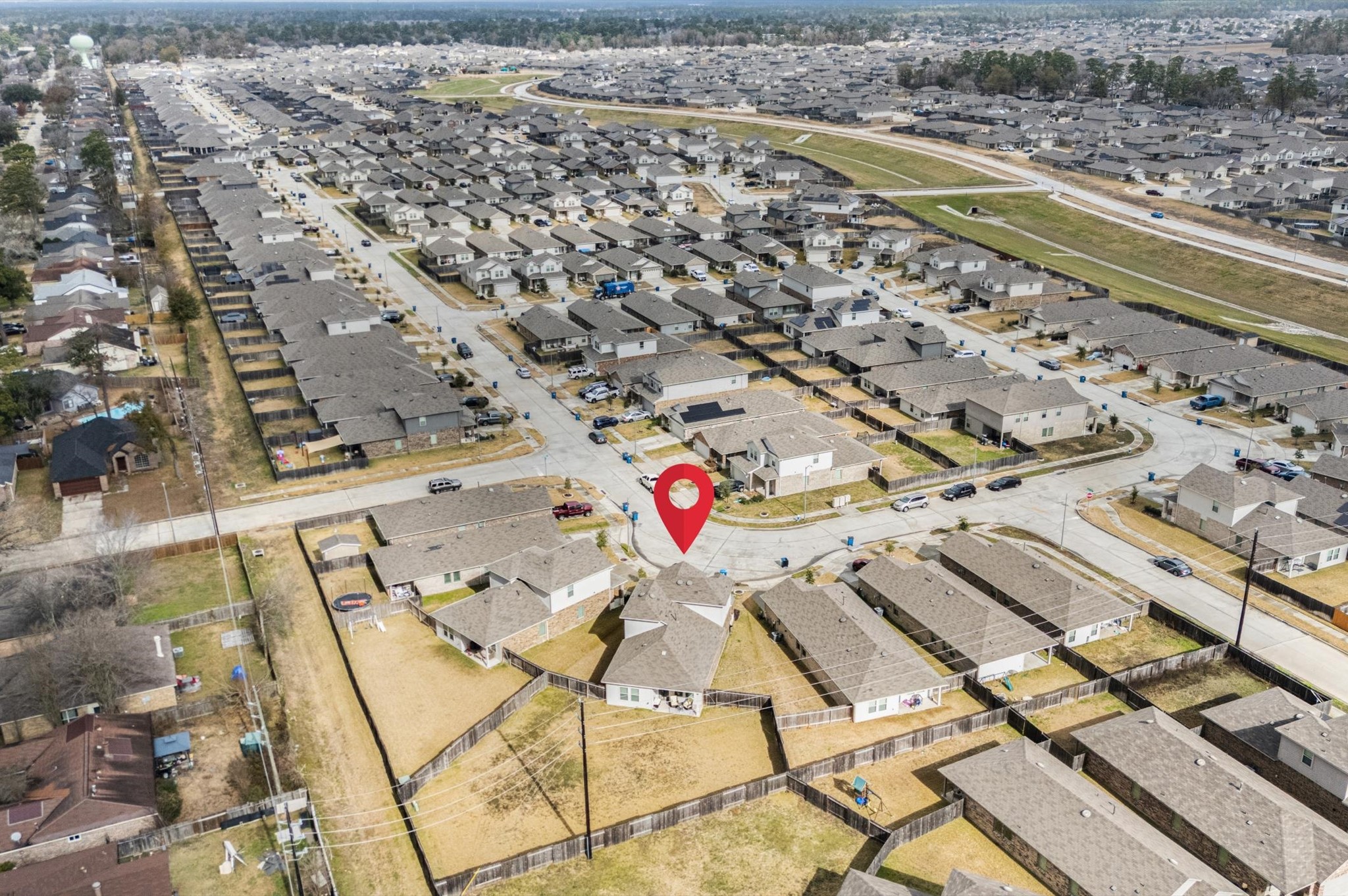 22803 Berthoud Trail Spring, TX 77373 - Photo 35 of 42 an aerial view of residential houses with outdoor space
