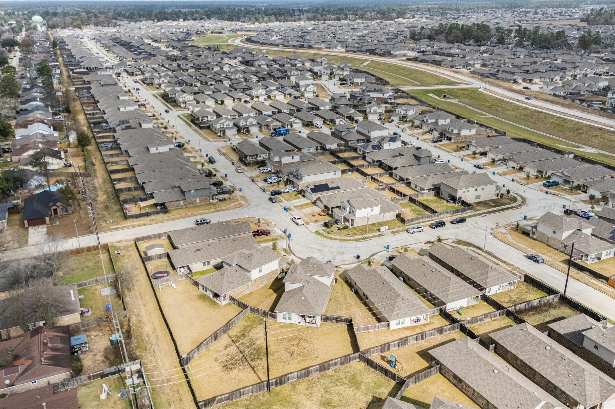 22803 Berthoud Trail Spring, TX 77373 - Photo 36 of 42 an aerial view of residential houses with outdoor space