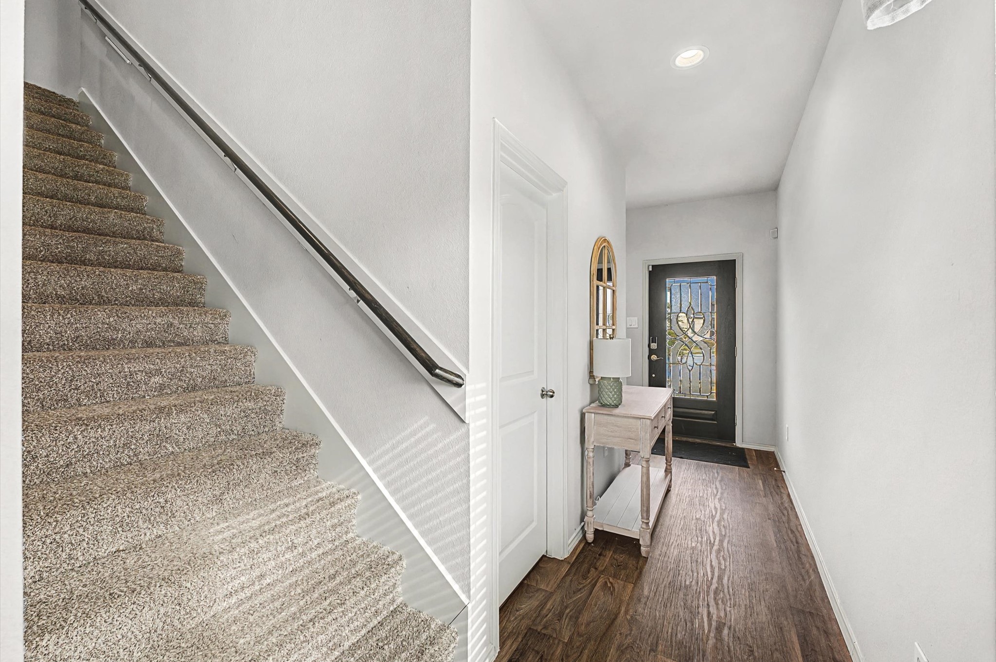 22803 Berthoud Trail Spring, TX 77373 - Photo 5 of 42 a view of entryway and hall with wooden floor