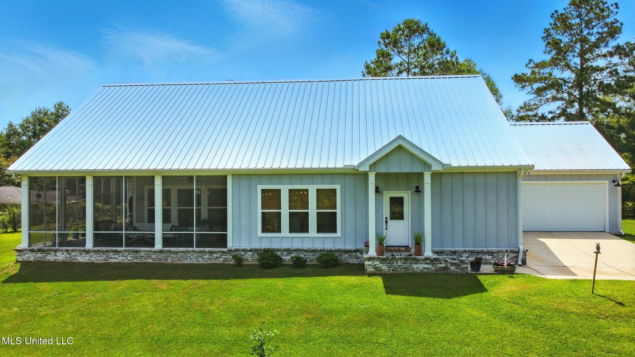 62 Treasure Point Carriere, MS 39426 - Photo 2 of 57 1_front elevation