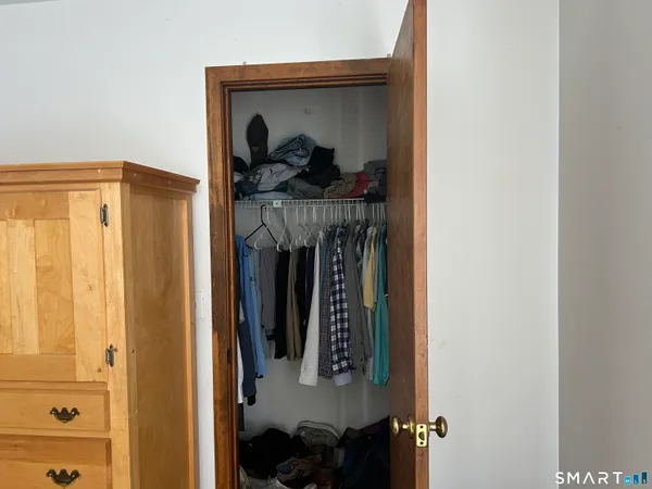 a view of a bedroom from a hallway