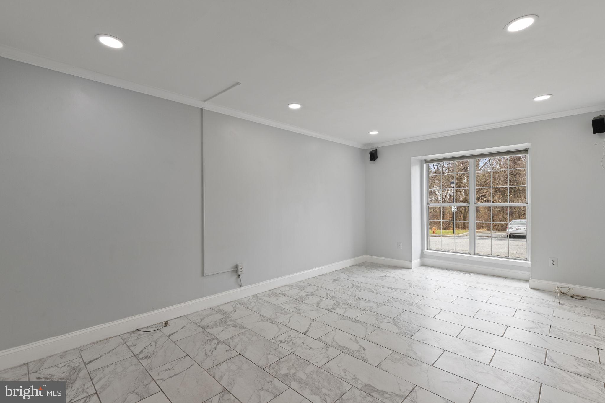 126 Gentlebrook Road Owings Mills, MD 21117 - Photo 11 of 30 a view of an empty room with a window