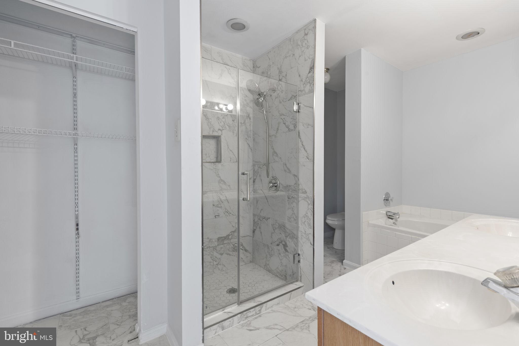 126 Gentlebrook Road Owings Mills, MD 21117 - Photo 17 of 30 a bathroom with a bathtub and shower