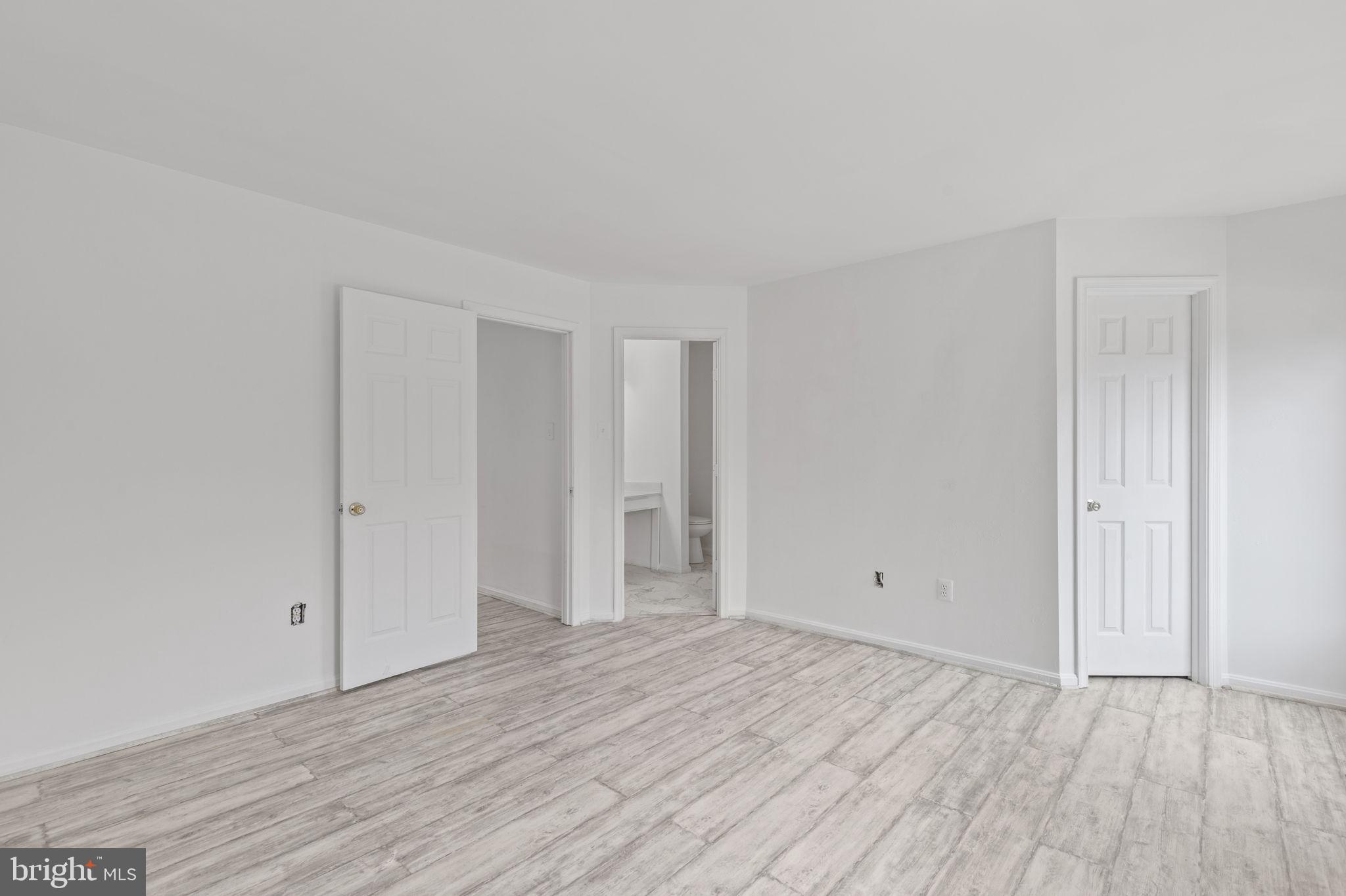 126 Gentlebrook Road Owings Mills, MD 21117 - Photo 18 of 30 a view of empty room with wooden floor